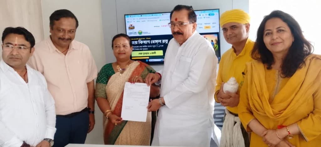 BKS West Bengal members holding the appointment letter with campaign website on screen